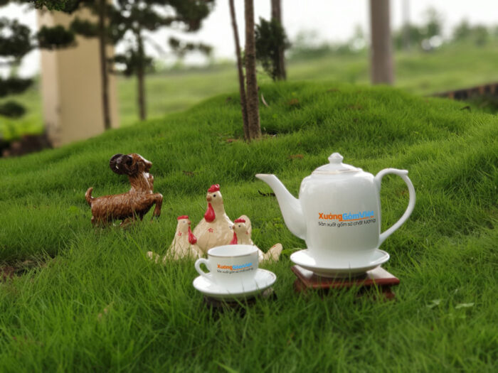 Bộ trà sứ trắng cao chỉ vàng AT-18