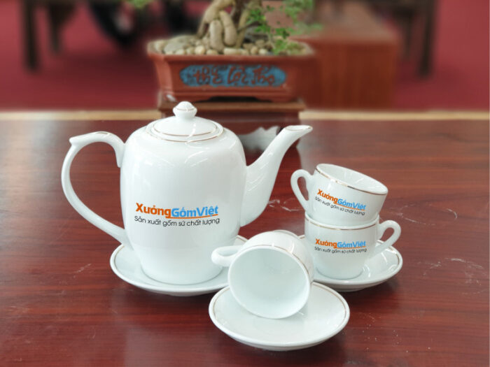 Bộ trà sứ trắng cao chỉ vàng AT-18