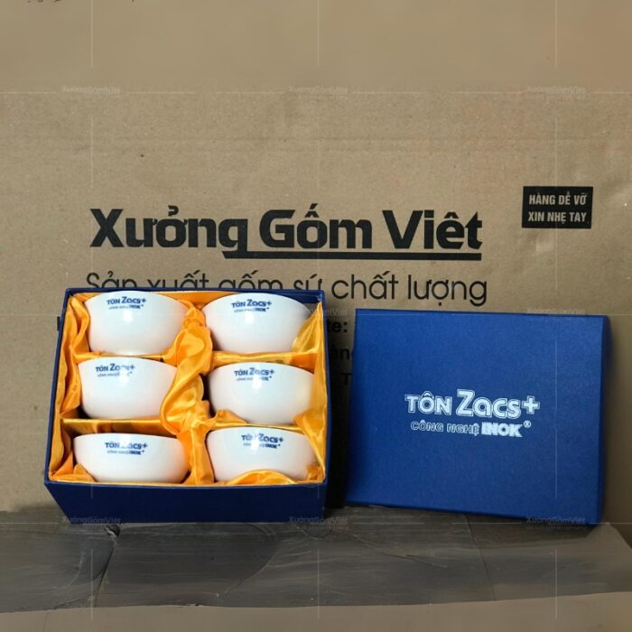 bo-6-bat-com-men-su-trang-bat-trang-in-logo-hop-xi-mau-xanh