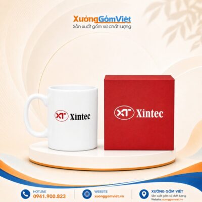 Cốc sứ in logo Xintec dáng trụ cao có quai màu trắng Bát Tràng M183