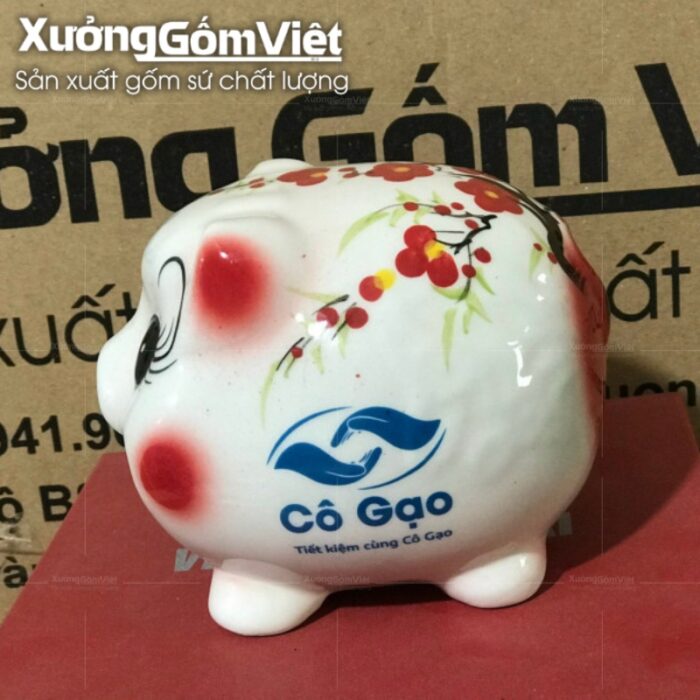 heo-dat-tiet-kiem-truyen-thong-dang-map-tron-mi-cong-ve-hoa-dao-do-in-logo-2