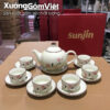 Bộ ấm chén sứ trắng in logo Sunjin dáng bầu tròn họa tiết hoa đào hồng Bát Tràng ACLG-41