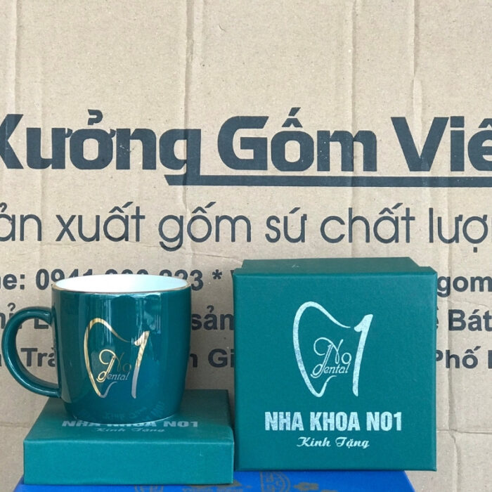 coc-su-in-logo-Nha-khoa-N01-dang-tru-lun-co-quai-mau-xanh-la-vien-kim-1