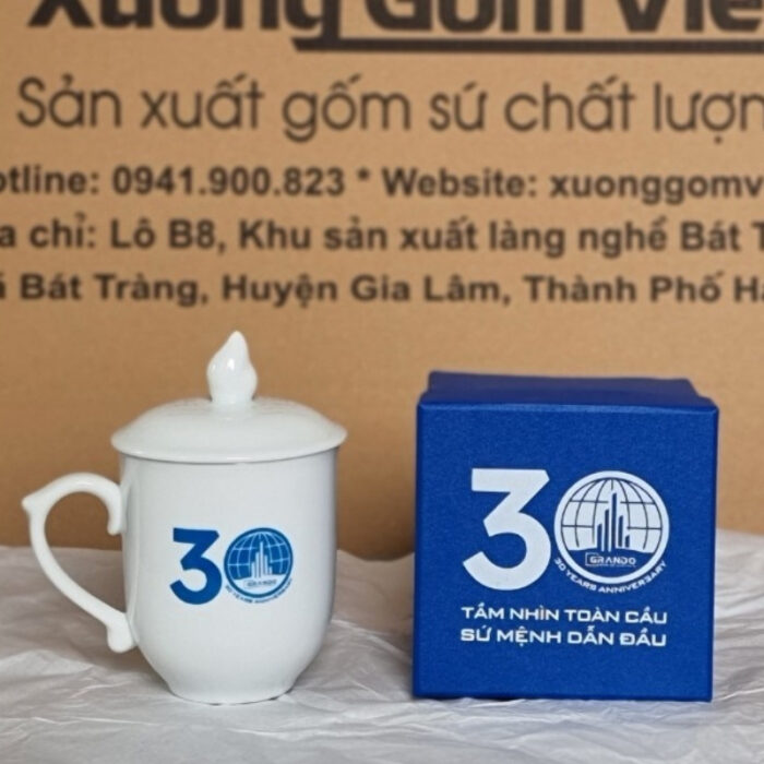 coc-su-in-logo-ky-niem-30-nam-GRANDO-dang-bau-co-nap-mau-trang-1