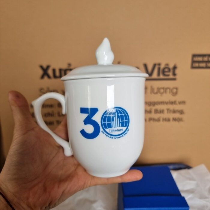 coc-su-in-logo-ky-niem-30-nam-GRANDO-dang-bau-co-nap-mau-trang-3